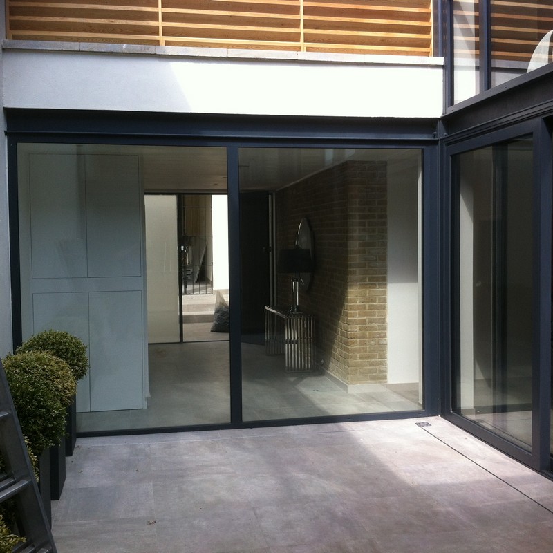 Floor-to-ceiling sliding doors opening to courtyard in Clapham Junction